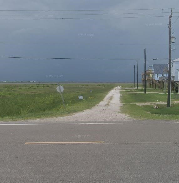 0 Nesmith Place Surfside Beach, TX 77541 - Photo 5 of 6 a view of a green field
