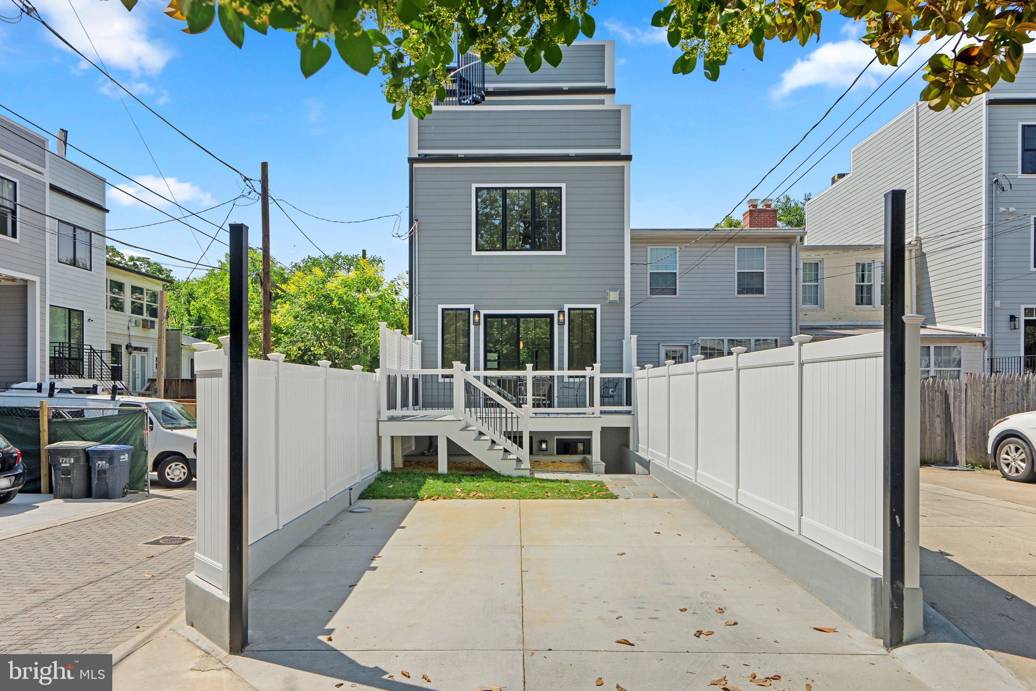 3713 R Street Northwest Washington, DC 20007 - Photo 46 of 48 Rear Exterior w/ Roll up door