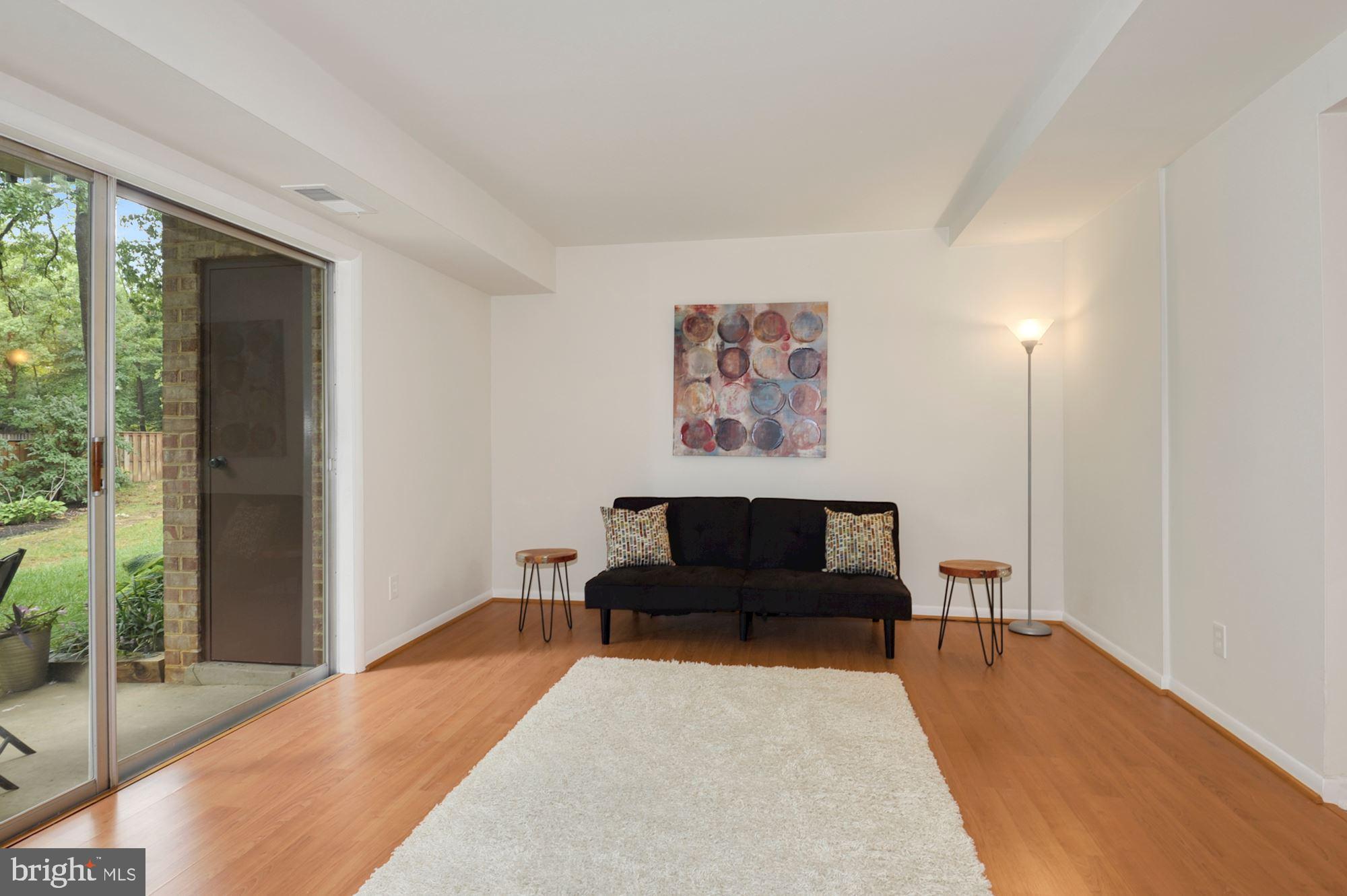 11627 Vantage Hill Road, Unit 1A Reston, VA 20190 - Photo 2 of 27 Spacious and light-filled living room