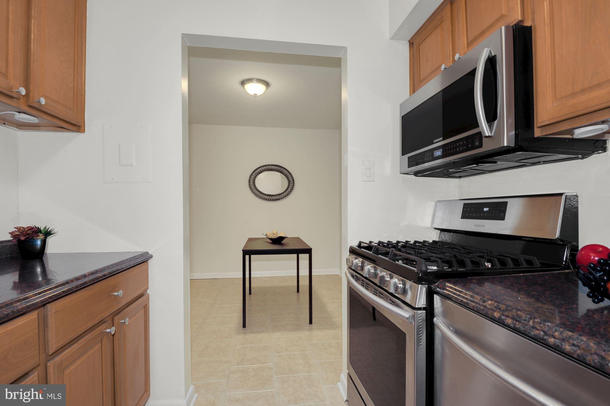 11627 Vantage Hill Road, Unit 1A Reston, VA 20190 - Photo 5 of 27 Updated kitchen