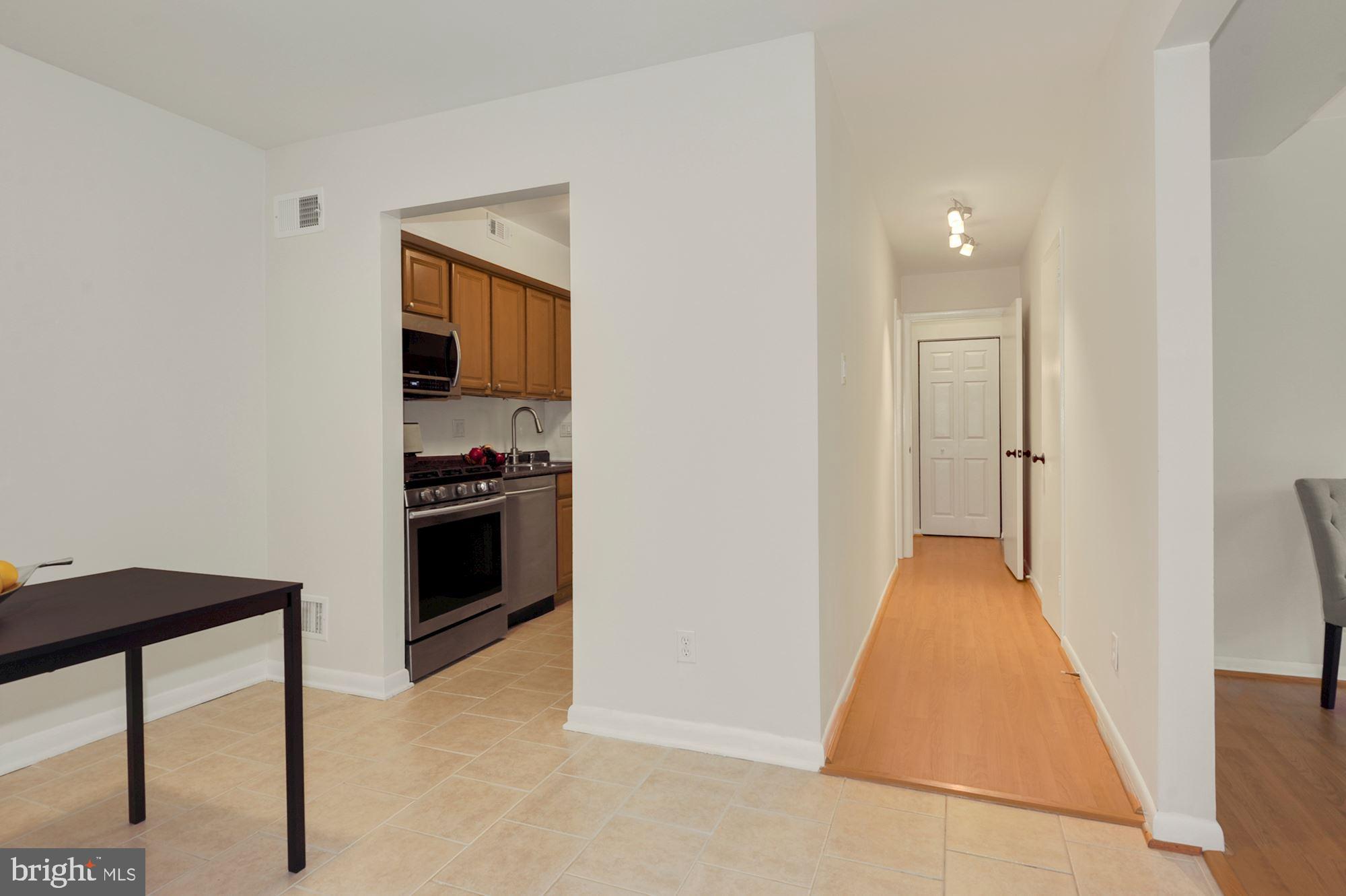 11627 Vantage Hill Road, Unit 1A Reston, VA 20190 - Photo 8 of 27 Hallway gives bedroom privacy