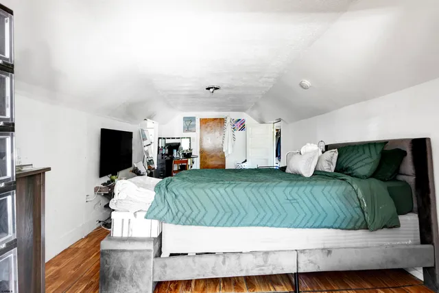 a living room with a couch and a flat screen tv