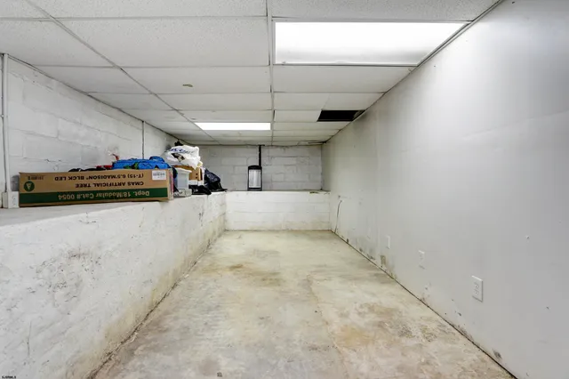 a view of parking garage with cars