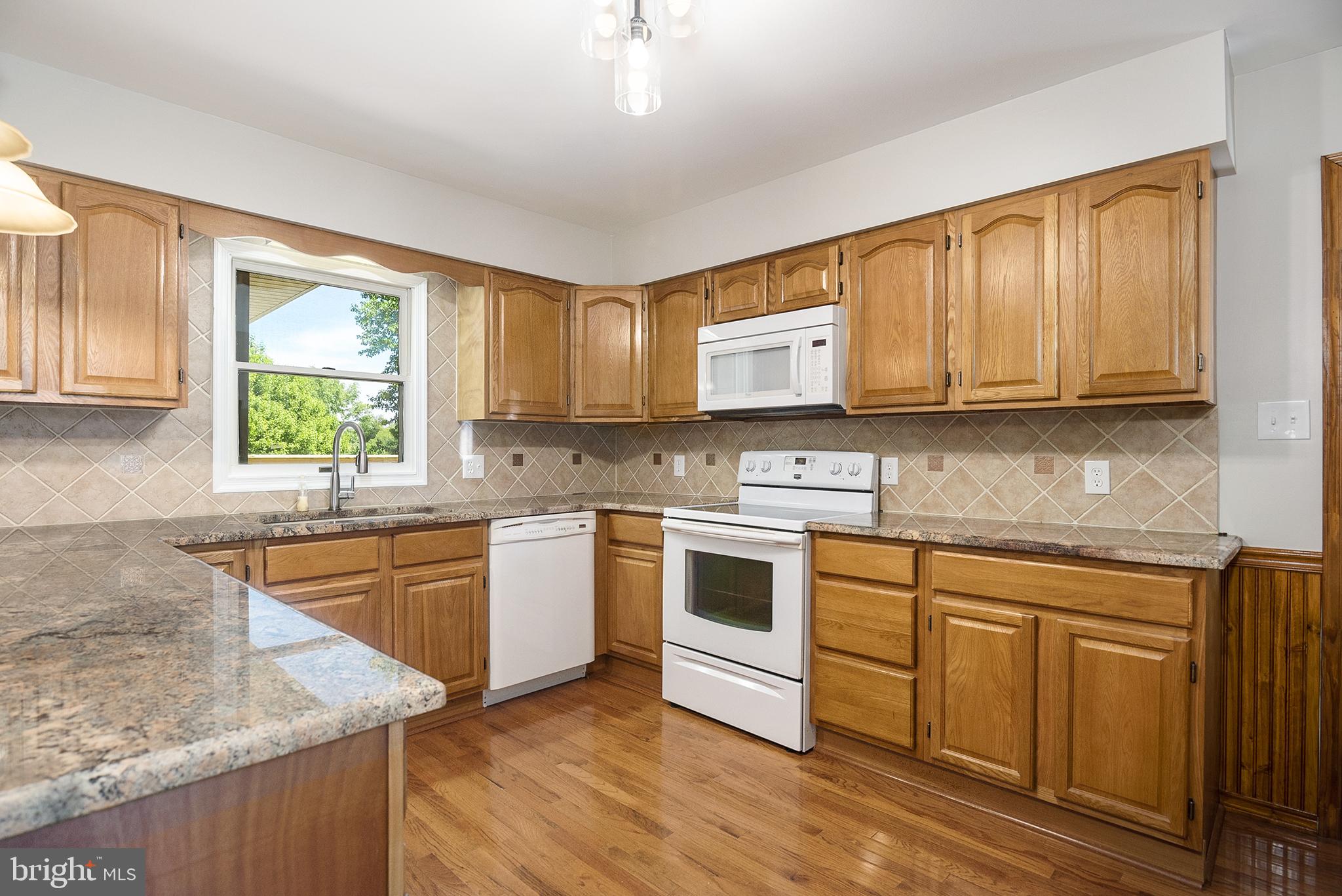 1719 Colora Road Colora, MD 21917 - Photo 13 of 26 Updated kitchen with granite countertops