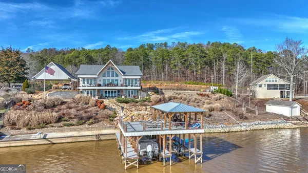 a view of a lake with a house