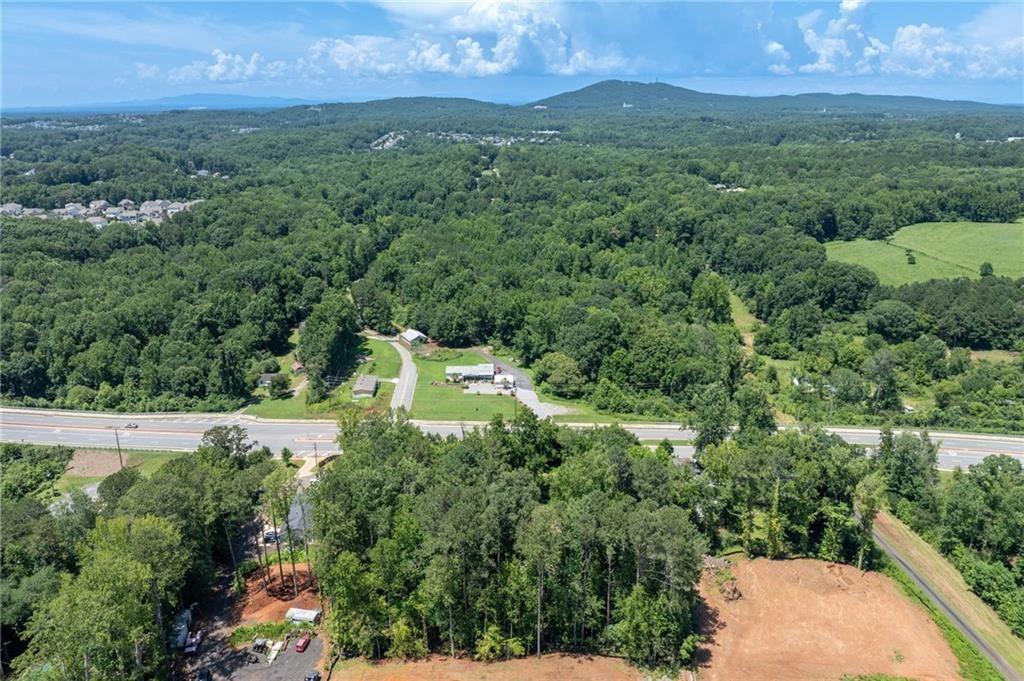 3815 Castleberry Road Cumming, GA 30040 - Photo 5 of 10 an aerial view of a house with a yard