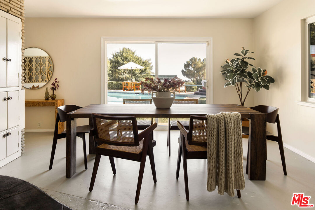 478 Devonwood Road Altadena, CA 91001 - Photo 11 of 42 a view of a dining room with furniture and window