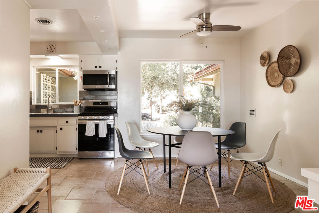 478 Devonwood Road Altadena, CA 91001 - Photo 14 of 42 a view of a dining room with furniture window and outside view