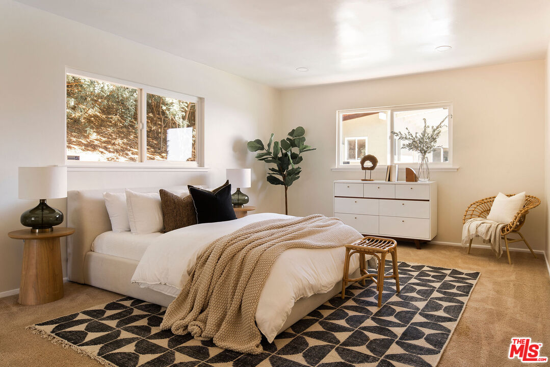 478 Devonwood Road Altadena, CA 91001 - Photo 23 of 42 a bedroom with a bed and a window