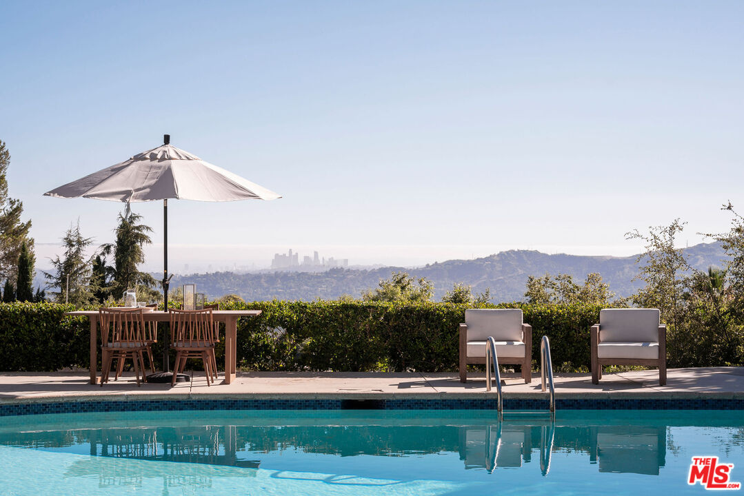 478 Devonwood Road Altadena, CA 91001 - Photo 26 of 42 a view of a lake with a mountain in the background