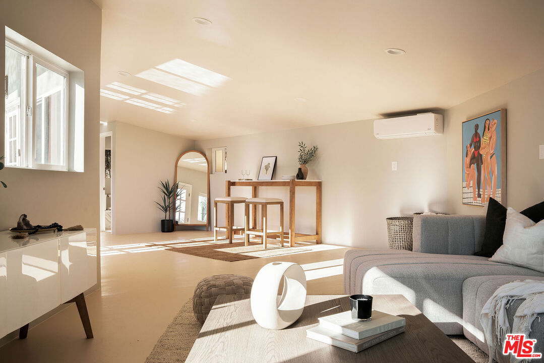 478 Devonwood Road Altadena, CA 91001 - Photo 30 of 42 a living room with furniture and a large window