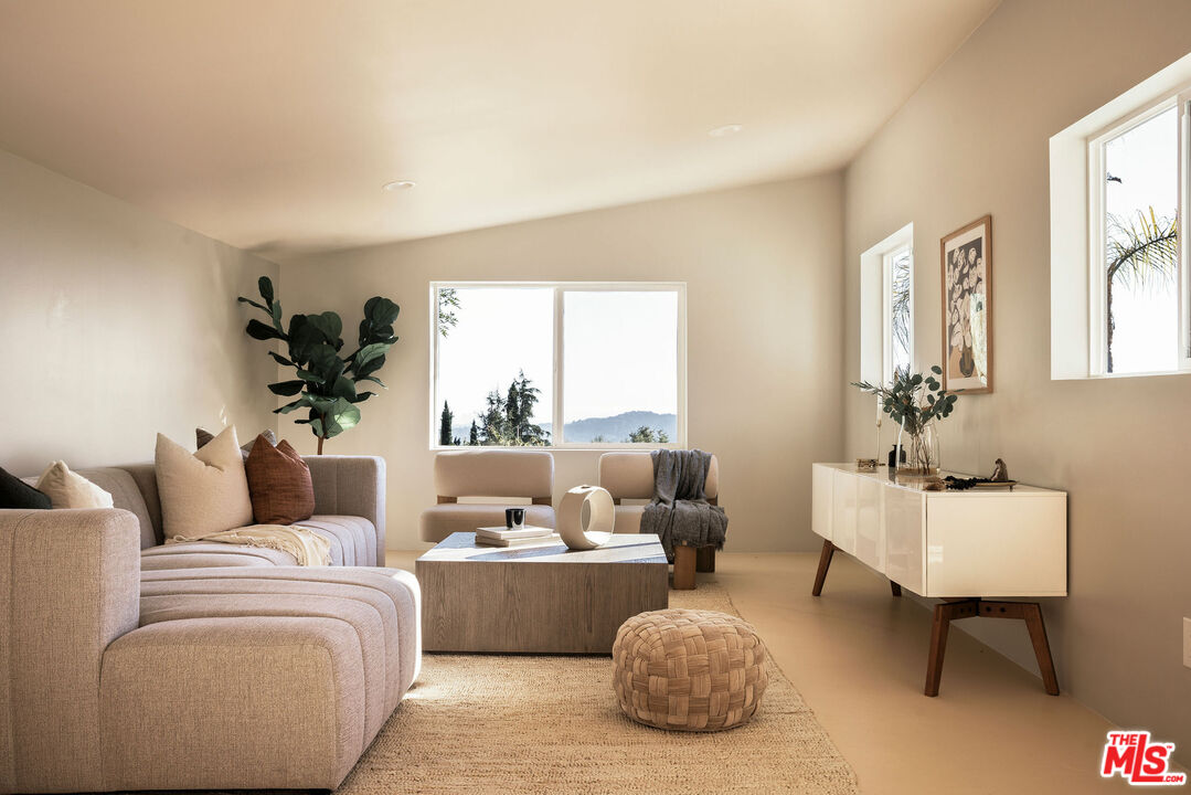 478 Devonwood Road Altadena, CA 91001 - Photo 31 of 42 a living room with furniture and a large window