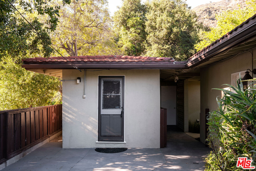 478 Devonwood Road Altadena, CA 91001 - Photo 36 of 42 a small house with a tree in the background