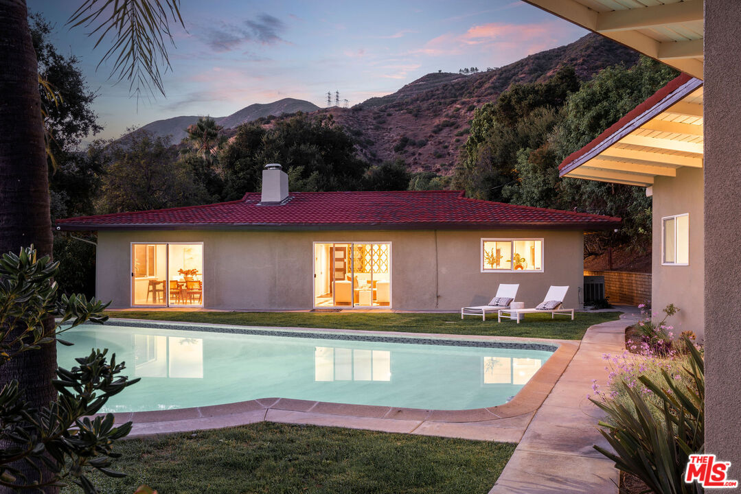 478 Devonwood Road Altadena, CA 91001 - Photo 40 of 42 a view of a house with a swimming pool