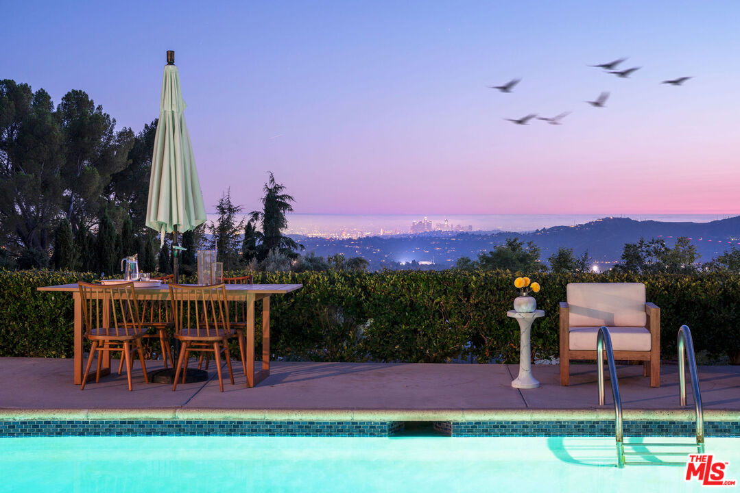 478 Devonwood Road Altadena, CA 91001 - Photo 41 of 42 a view of a chairs and table in patio with a yard