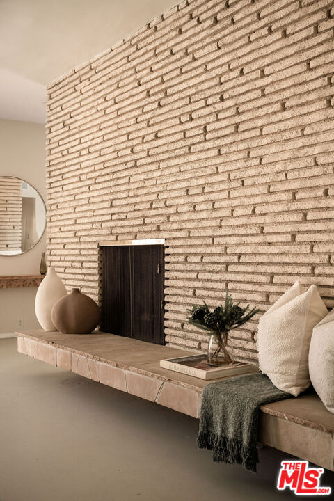 478 Devonwood Road Altadena, CA 91001 - Photo 8 of 42 a living room with furniture and a fireplace