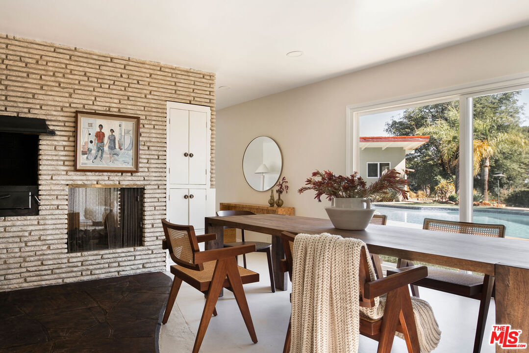 478 Devonwood Road Altadena, CA 91001 - Photo 9 of 42 a view of a dining room with furniture window and wooden floor