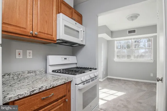 $1,975 | 7096 Spring Garden Drive, Unit 102, Springfield, VA 22150