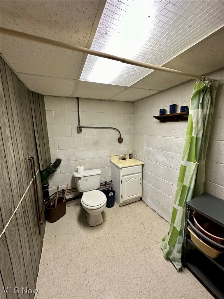 343 Raleigh Avenue Weirton, WV 26062 - Photo 33 of 46 Bathroom with a paneled ceiling, a shower with curtain, toilet, and vanity