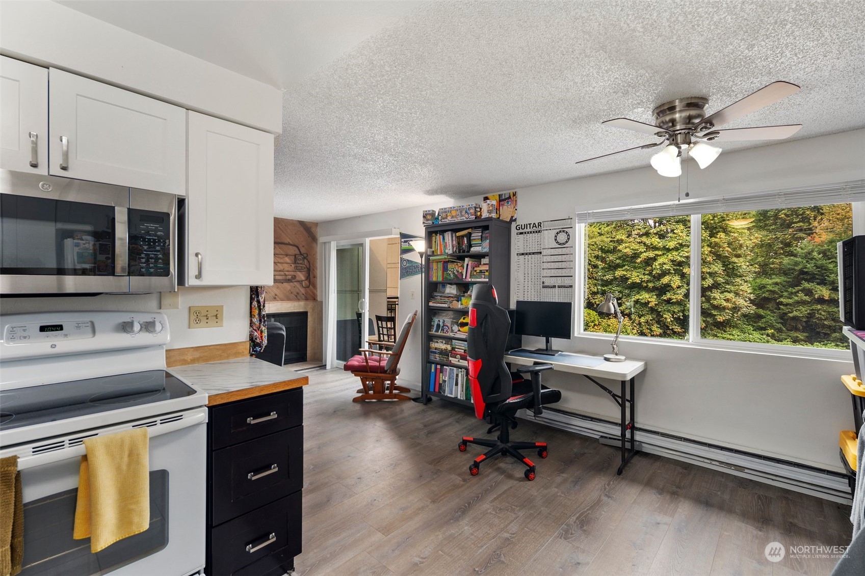 220 Southwest Clark Street, Unit B302 Issaquah, WA 98027 - Photo 13 of 20 a view of a kitchen with workspace and a window