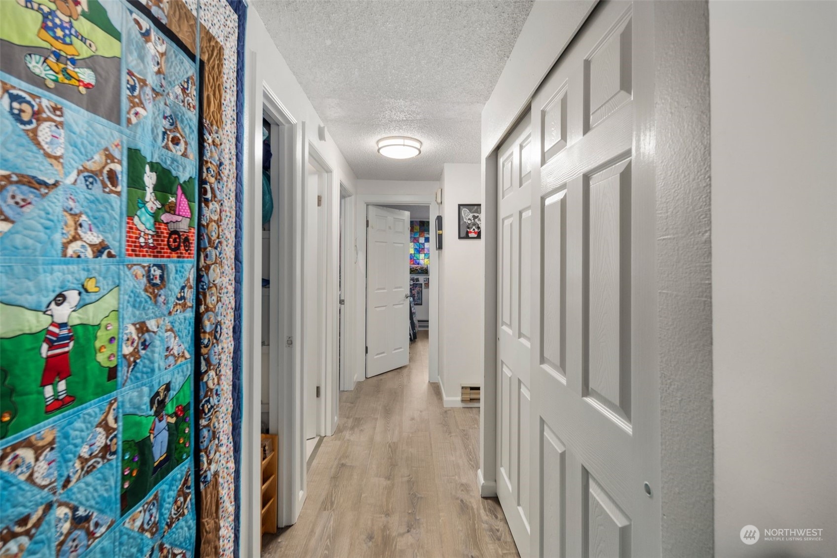 220 Southwest Clark Street, Unit B302 Issaquah, WA 98027 - Photo 15 of 20 a view of an entryway with wooden floor