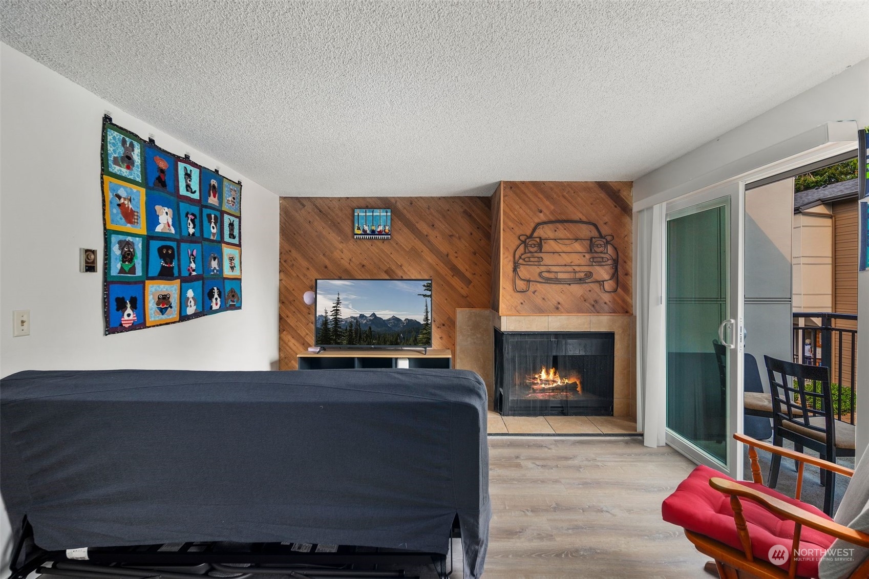 220 Southwest Clark Street, Unit B302 Issaquah, WA 98027 - Photo 3 of 20 a living room with furniture and a fireplace