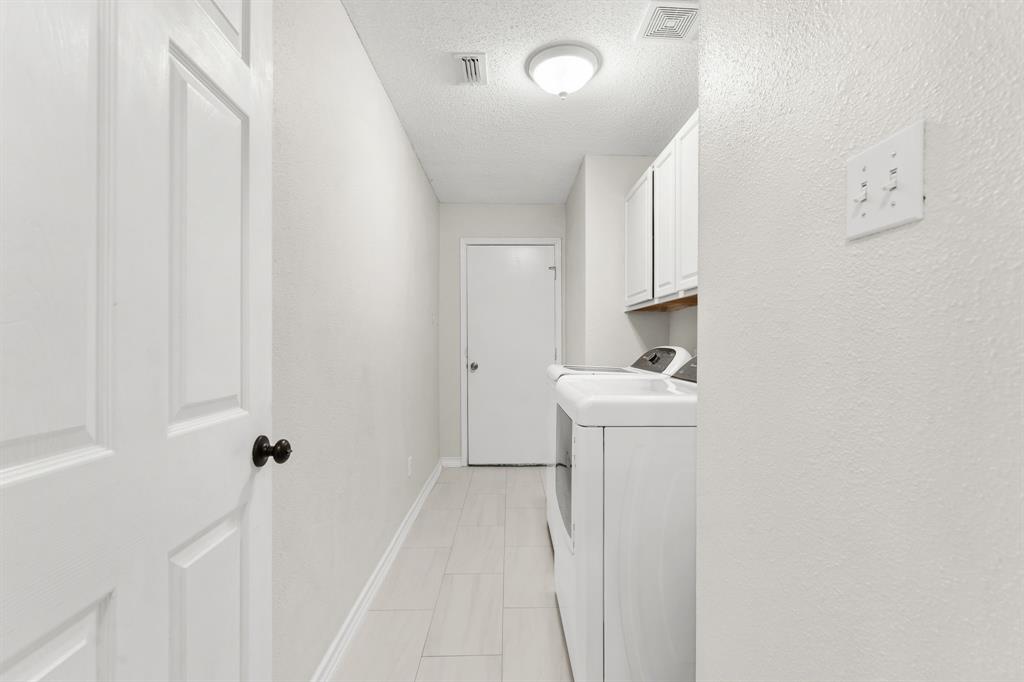 7321 Summit View Lane Sachse, TX 75048 - Photo 21 of 28 a bathroom with a sink a toilet and shower