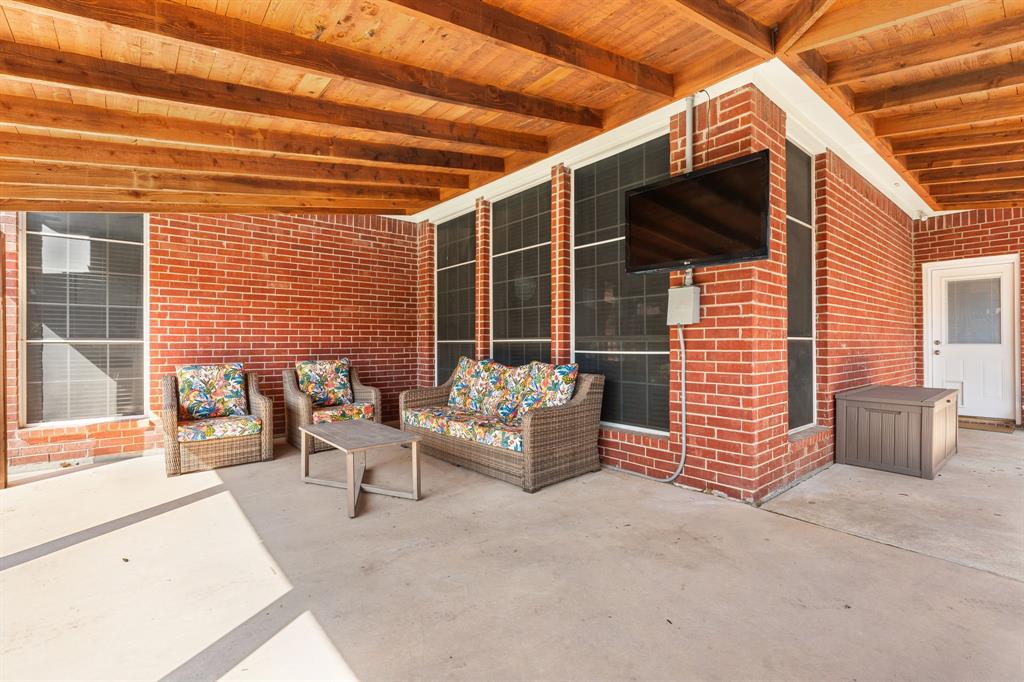 7321 Summit View Lane Sachse, TX 75048 - Photo 27 of 28 a balcony with furniture and a potted plant