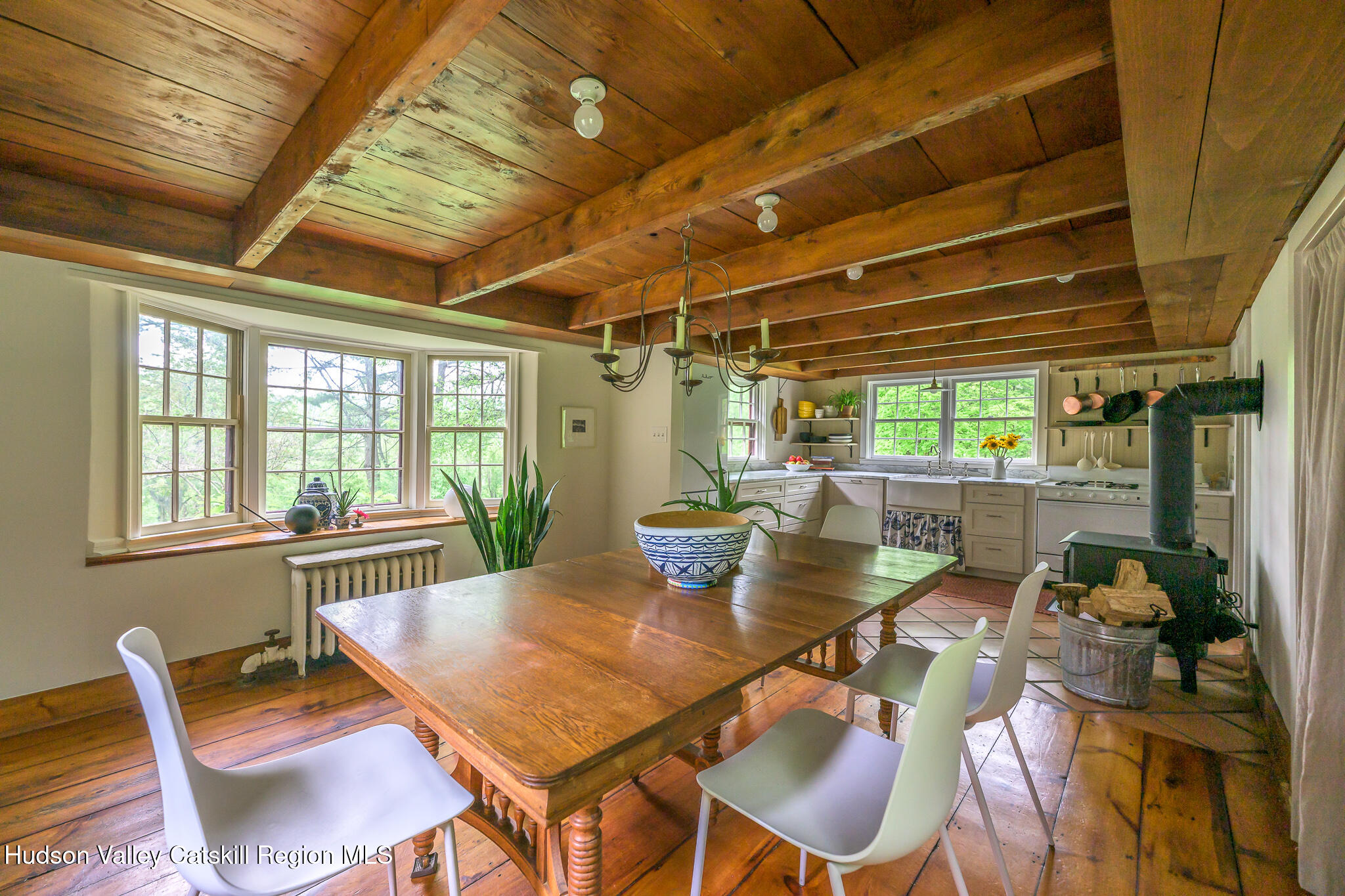 1963 County Rte 5 Canaan, NY 12029 - Photo 15 of 46 a view of a dining room with furniture wooden floor and a chandelier