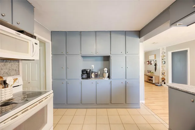 a view of a kitchen with a sink