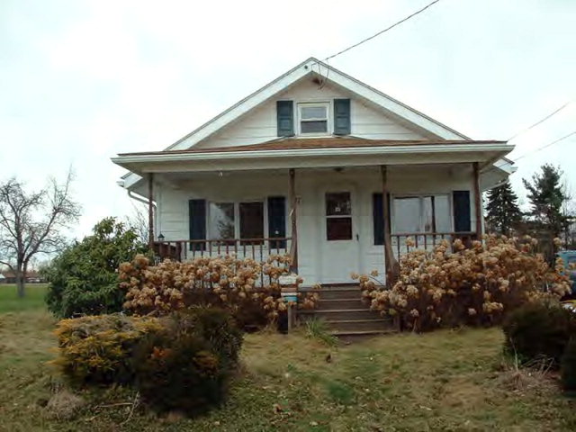 97 Lobaugh Hill Road Rimersburg, PA 16248 - Photo 1 of 1 a front view of a house with a garden