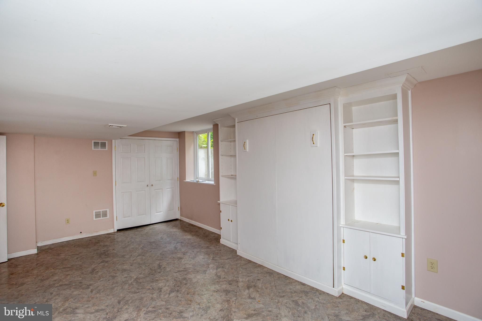 363 Birdsong Way Doylestown, PA 18901 - Photo 34 of 58 Built in Murphy bed and bookshelves