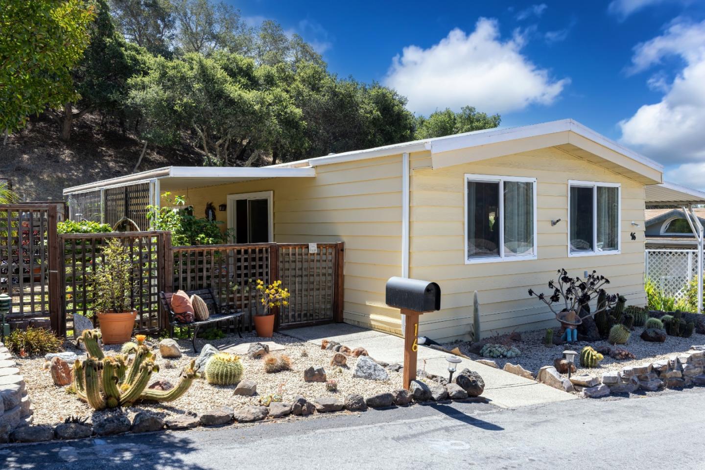 270 Hames Road, Unit 16 Corralitos, CA 95076 - Photo 1 of 20 a front view of a house with garden
