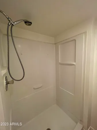 a hallway with cabinet