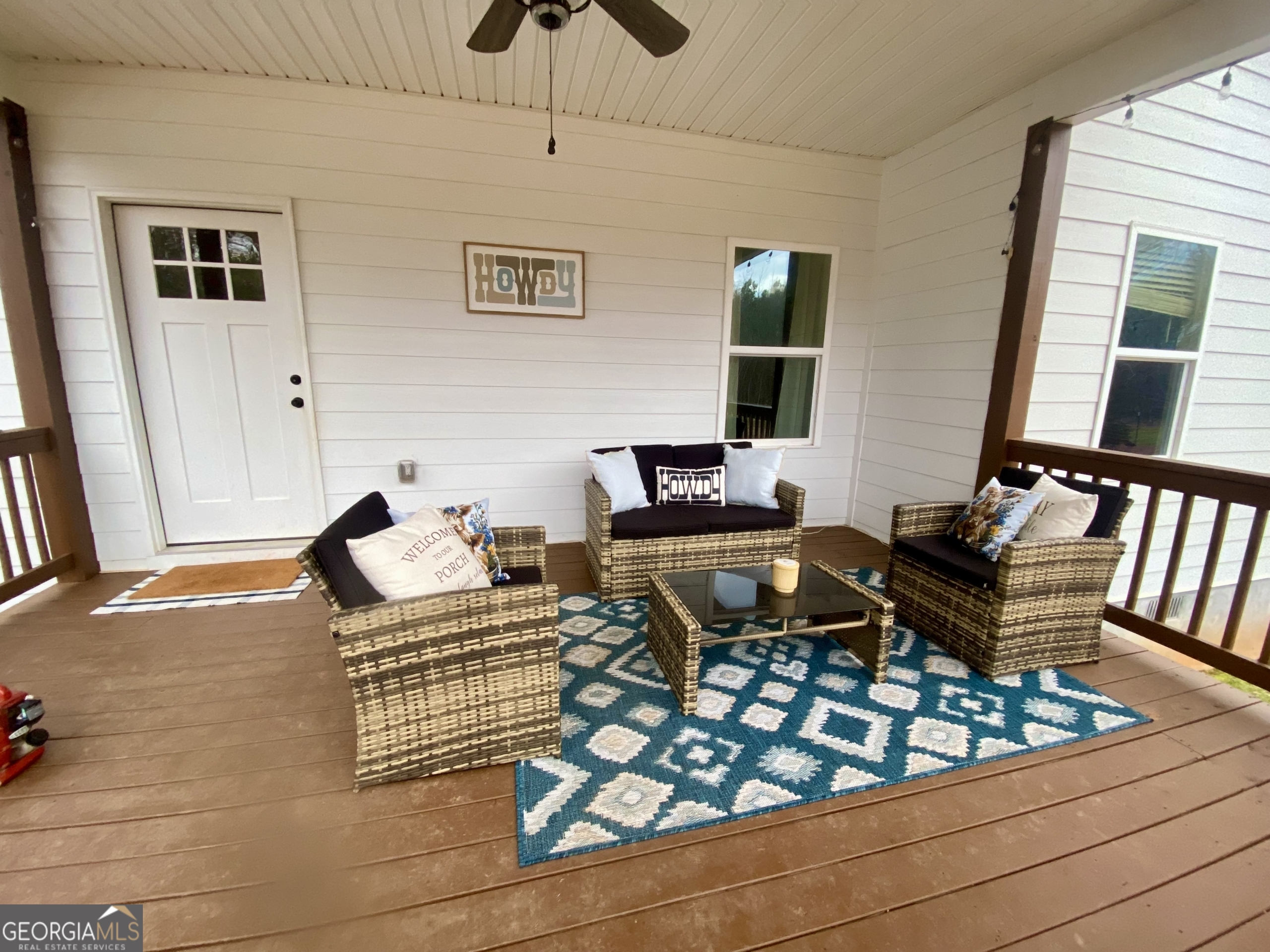 1250 Godfrey Road Madison, GA 30650 - Photo 11 of 42 a bedroom with furniture and a window