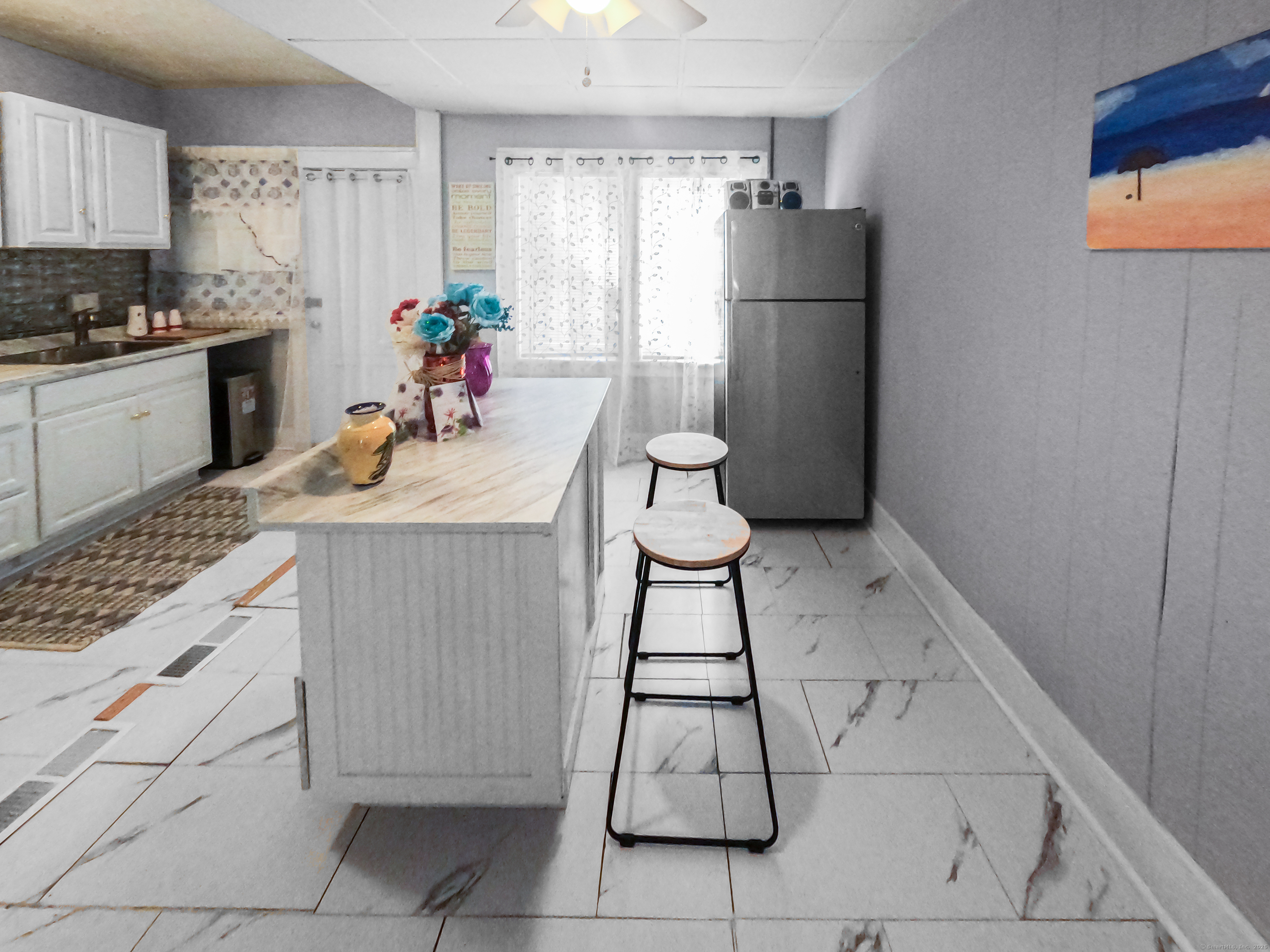 Undisclosed Address Waterbury, CT 06704 - Photo 11 of 36 a kitchen with stainless steel appliances a stove a refrigerator and a refrigerator