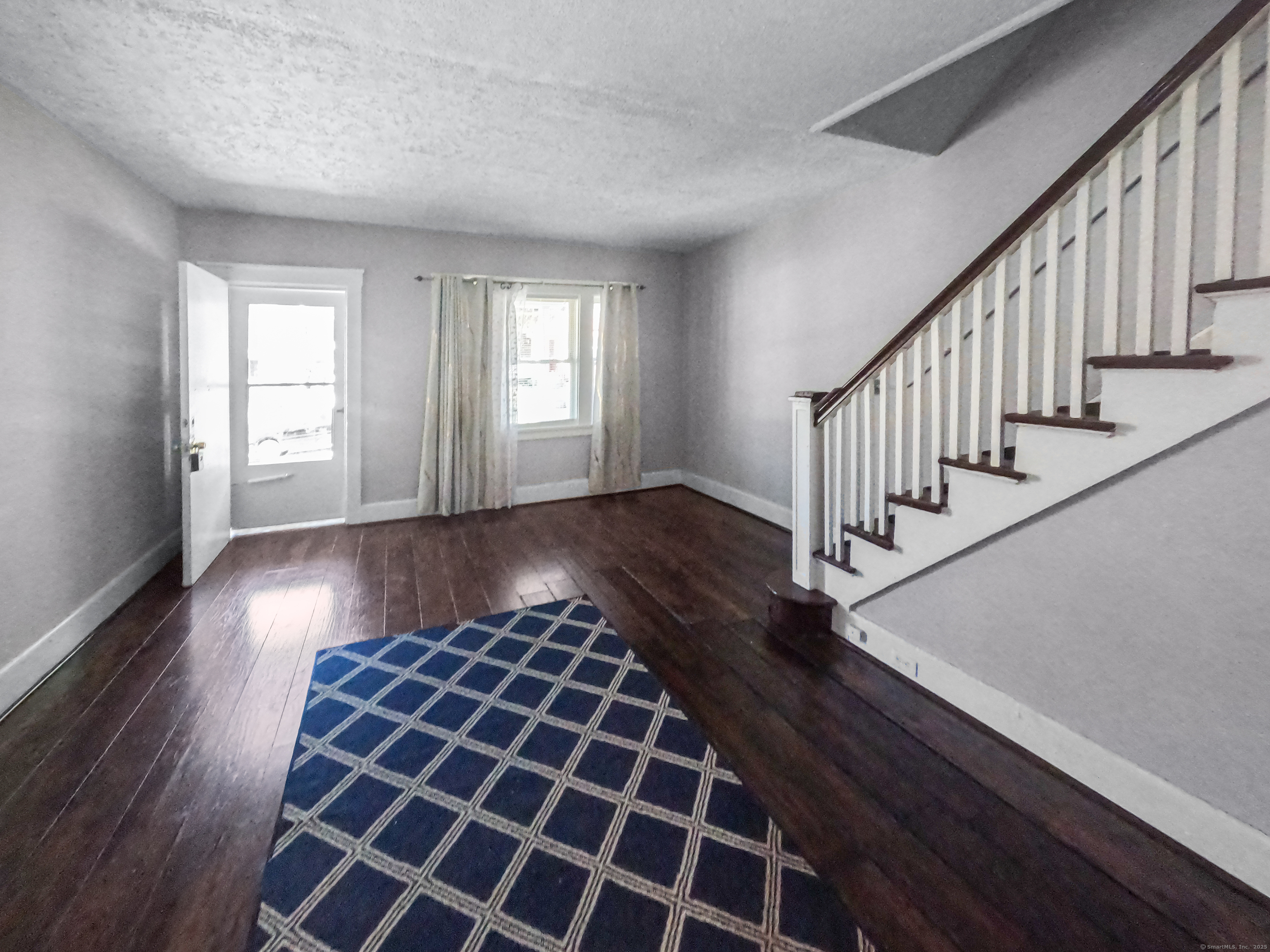 Undisclosed Address Waterbury, CT 06704 - Photo 15 of 36 a view of an entryway with wooden floor