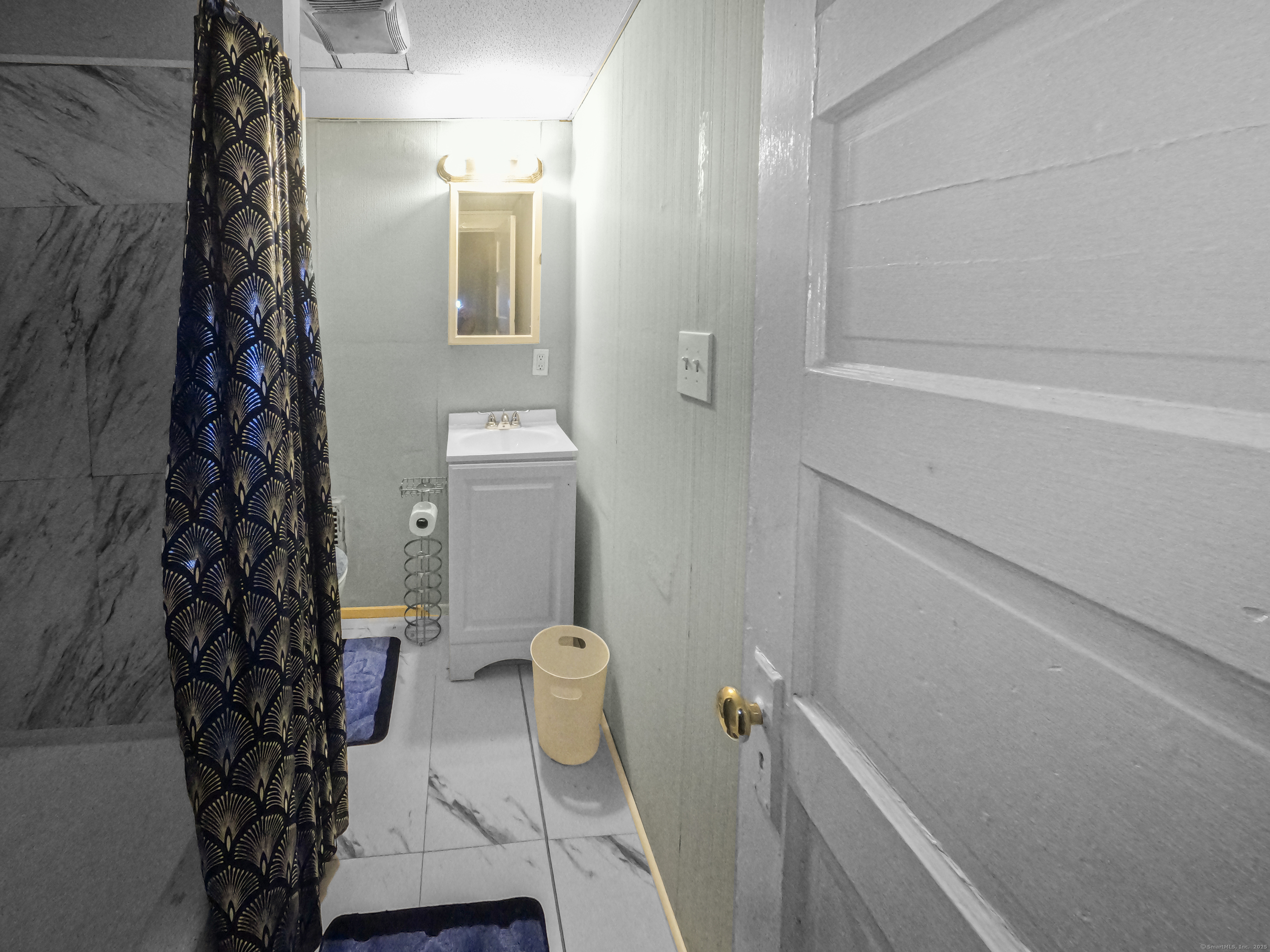 Undisclosed Address Waterbury, CT 06704 - Photo 18 of 36 a bathroom with a sink and toilet