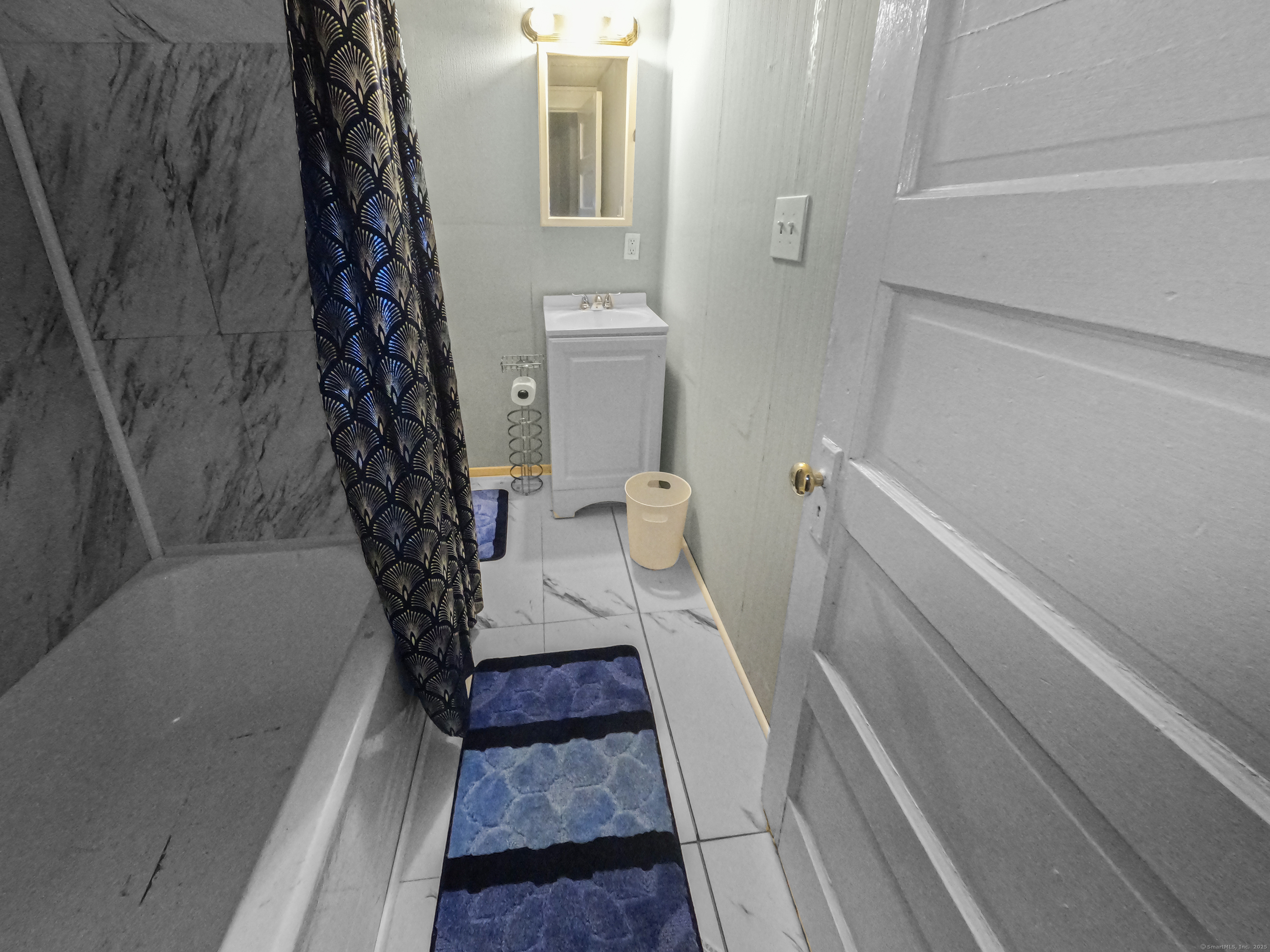 Undisclosed Address Waterbury, CT 06704 - Photo 21 of 36 a bathroom with a toilet and a shower