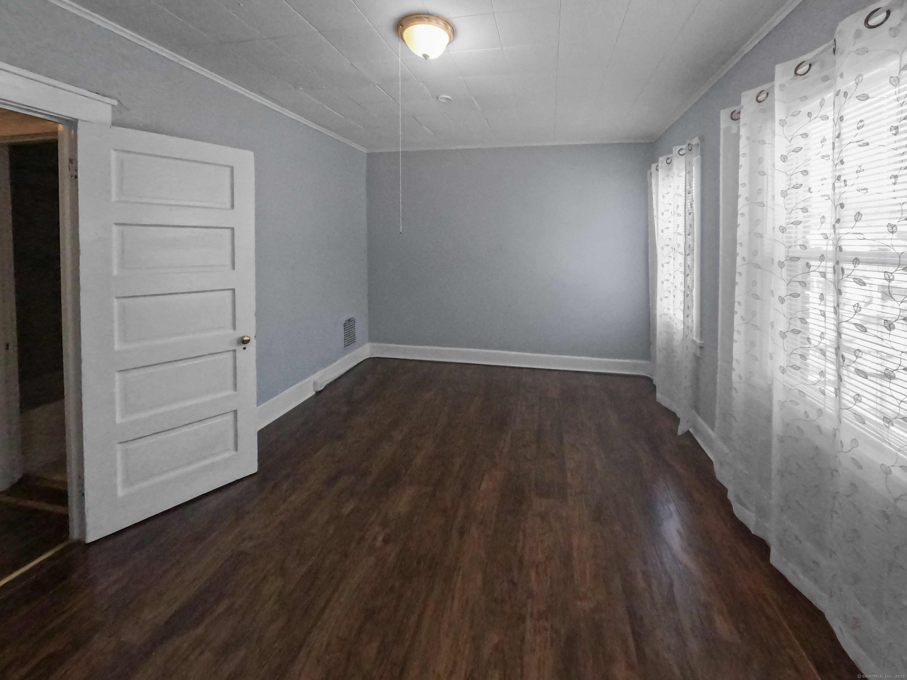 Undisclosed Address Waterbury, CT 06704 - Photo 24 of 36 wooden floor in an empty room with a window