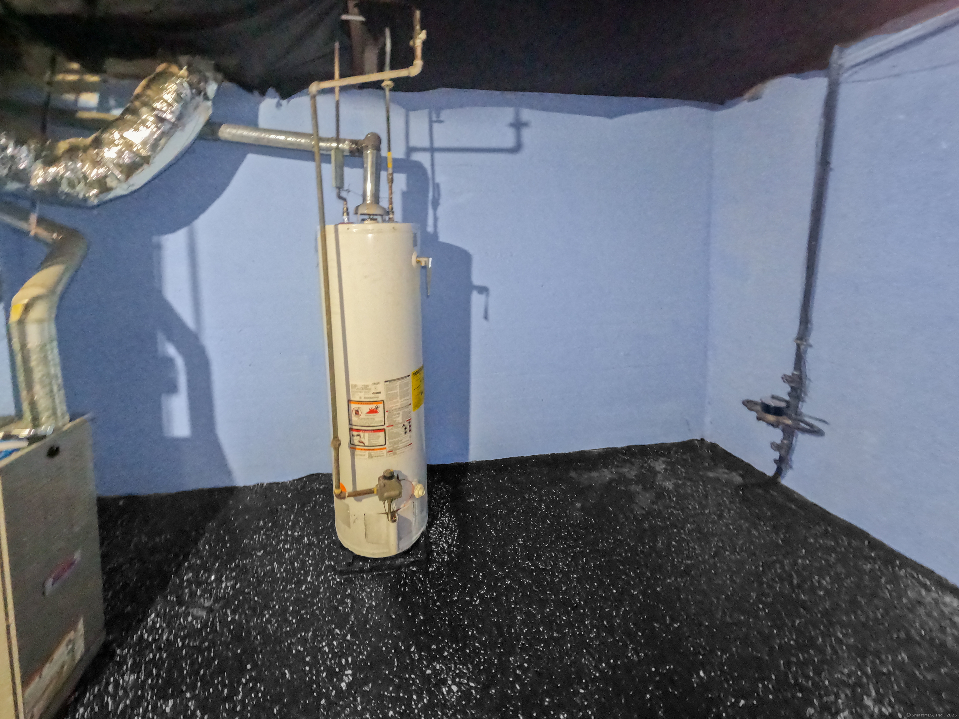 Undisclosed Address Waterbury, CT 06704 - Photo 28 of 36 a view of water heater room