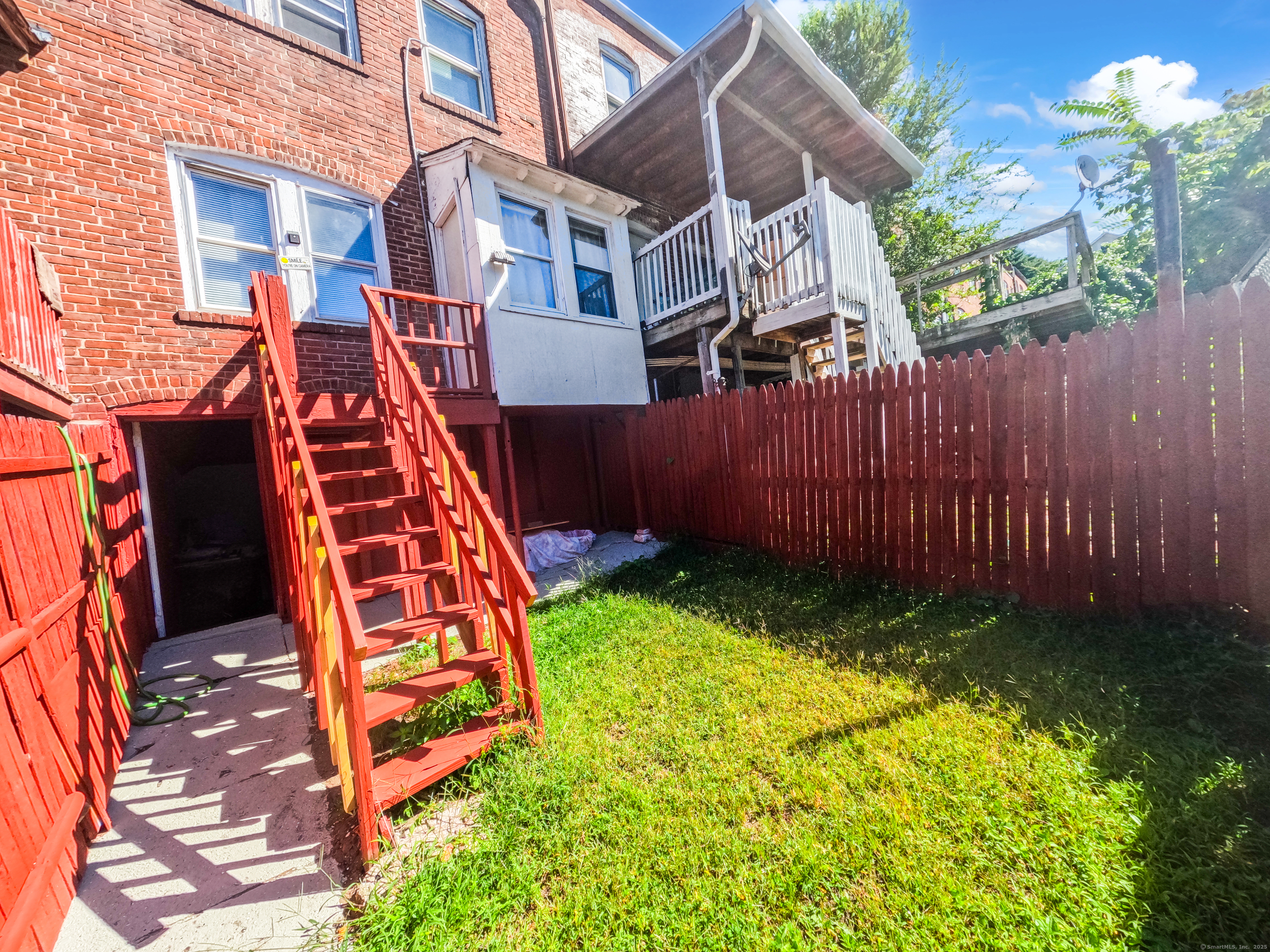 Undisclosed Address Waterbury, CT 06704 - Photo 33 of 36 a view of a backyard with plants