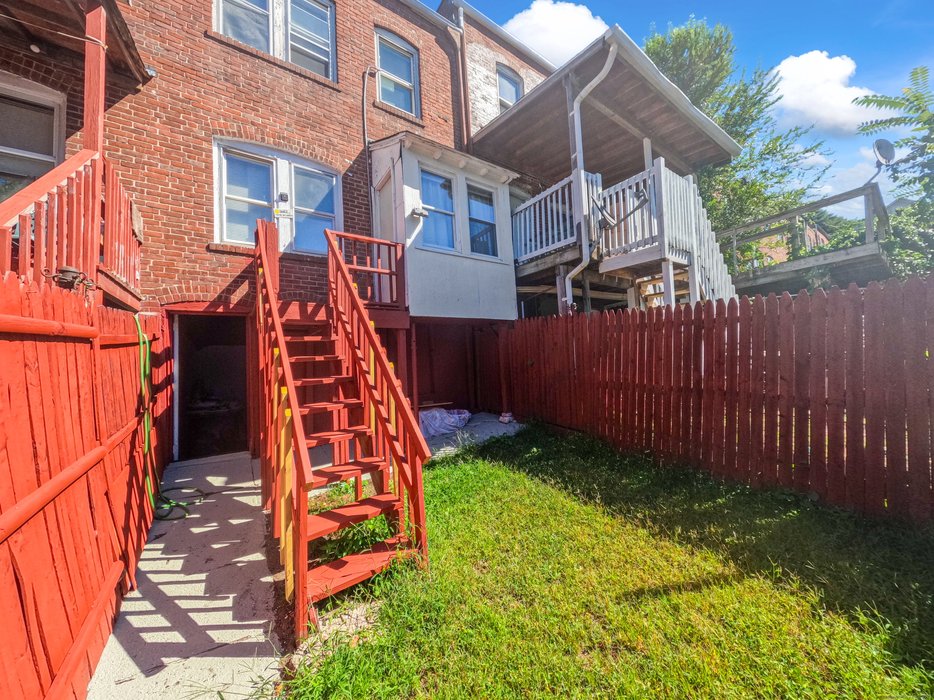 Undisclosed Address Waterbury, CT 06704 - Photo 35 of 36 a view of a backyard with plants