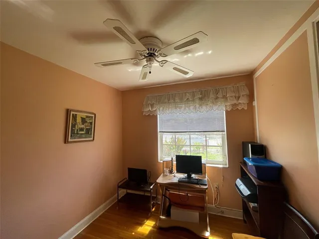 a workspace with furniture and a window