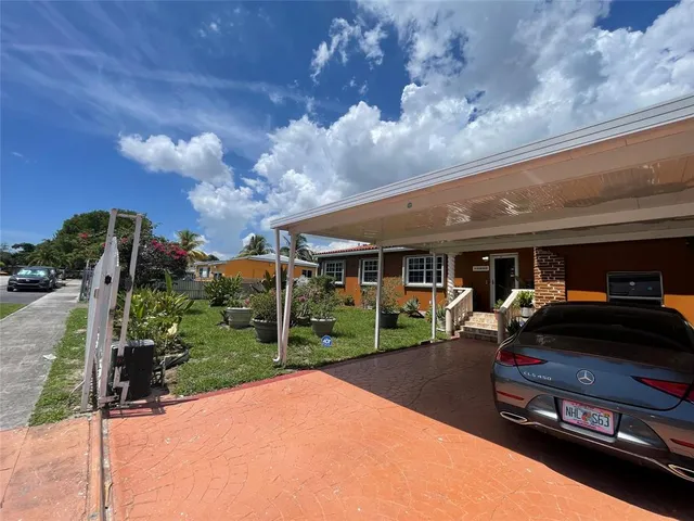 a car parked in front of a building