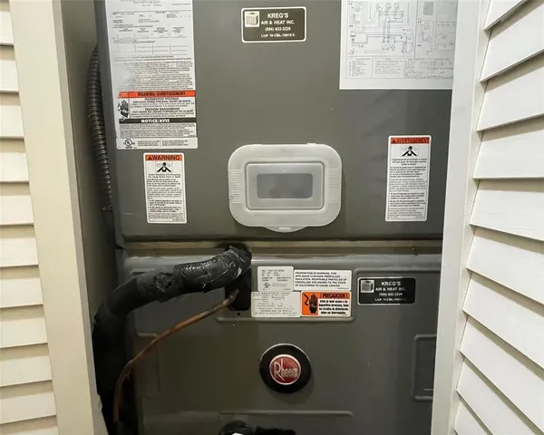 a view of a brick house with a roof deck