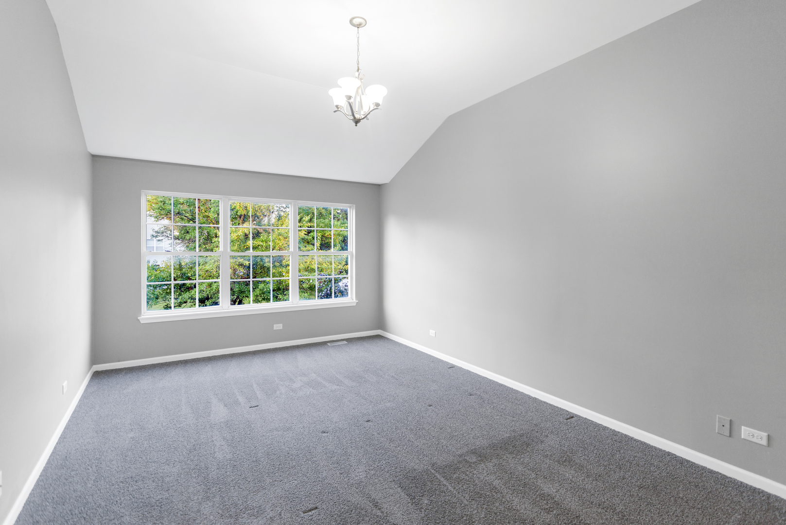 85 Old Post Road Oswego, IL 60543 - Photo 19 of 38 an empty room with a window