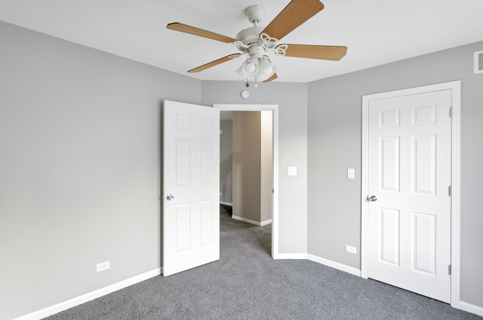 85 Old Post Road Oswego, IL 60543 - Photo 29 of 38 a view of a chandelier fan and a hallway