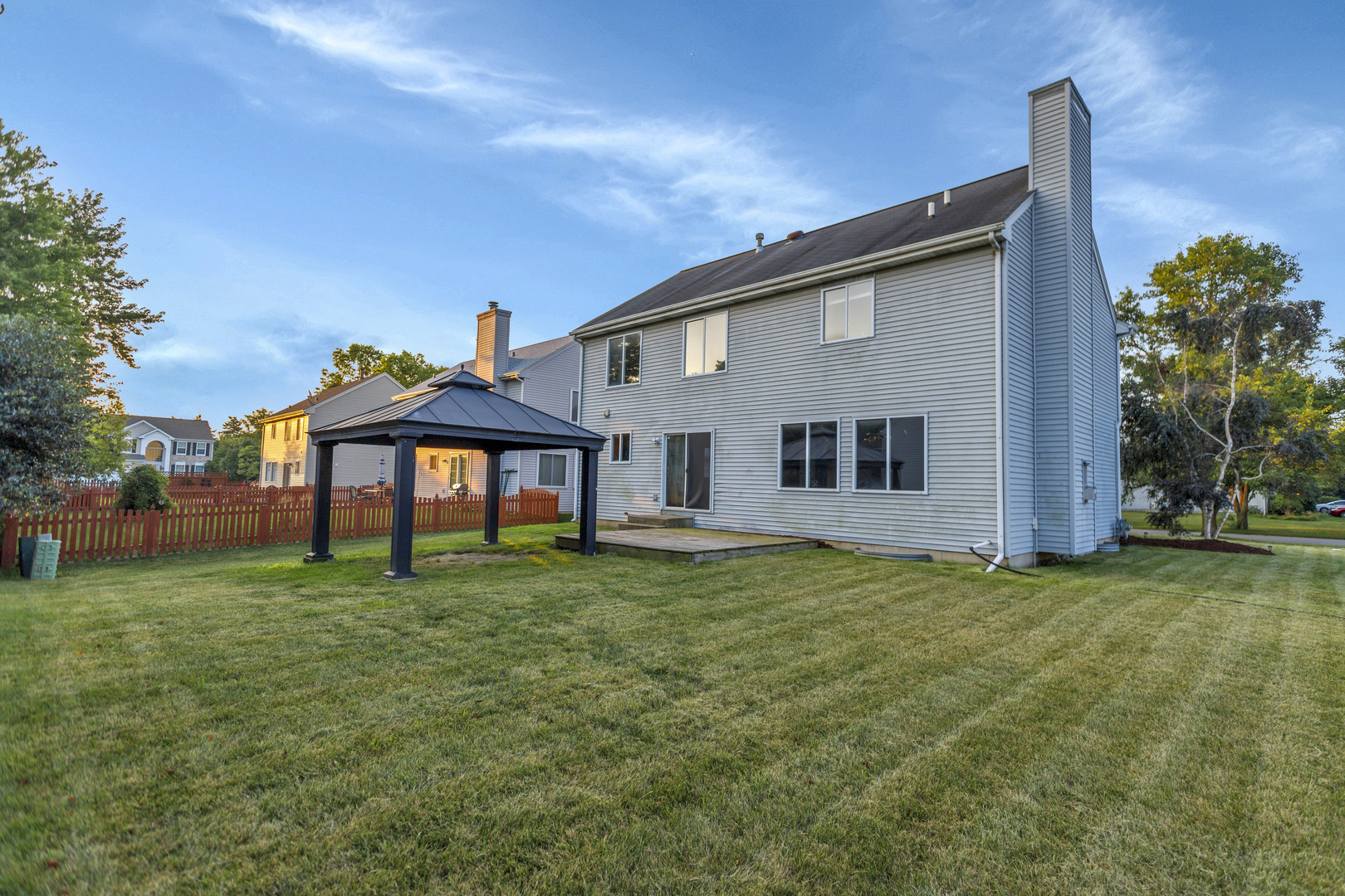 85 Old Post Road Oswego, IL 60543 - Photo 36 of 38 a front view of a house with a yard