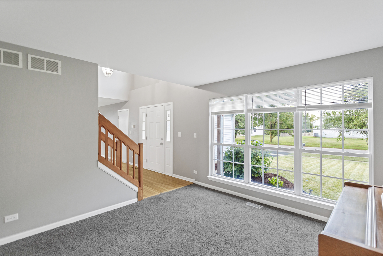 85 Old Post Road Oswego, IL 60543 - Photo 6 of 38 a view of an empty room with windows